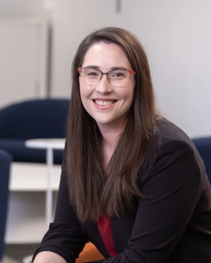 smiling person in business attire